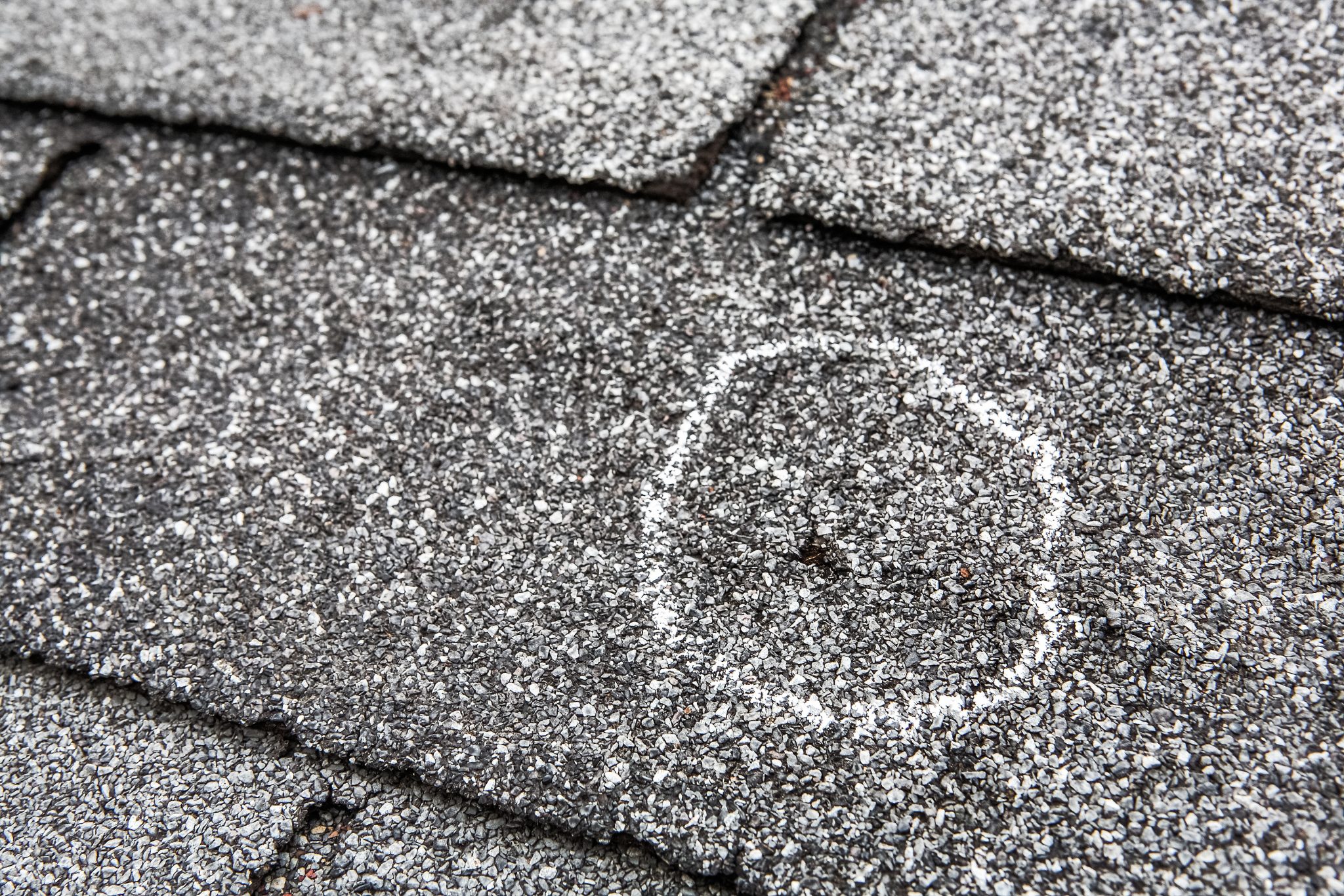 how-to-identify-hail-roof-damage-vera-roofing-construction